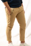Trouser with stripes and decorative chain in beige
